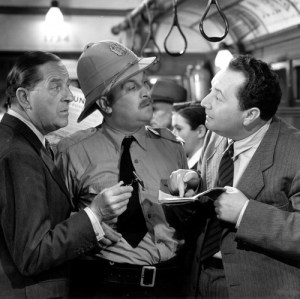 passport-to-pimlico-149-001-stanley-holloway-on-tube-00m-fgq