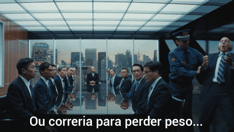 A man being thrown out of a meeting